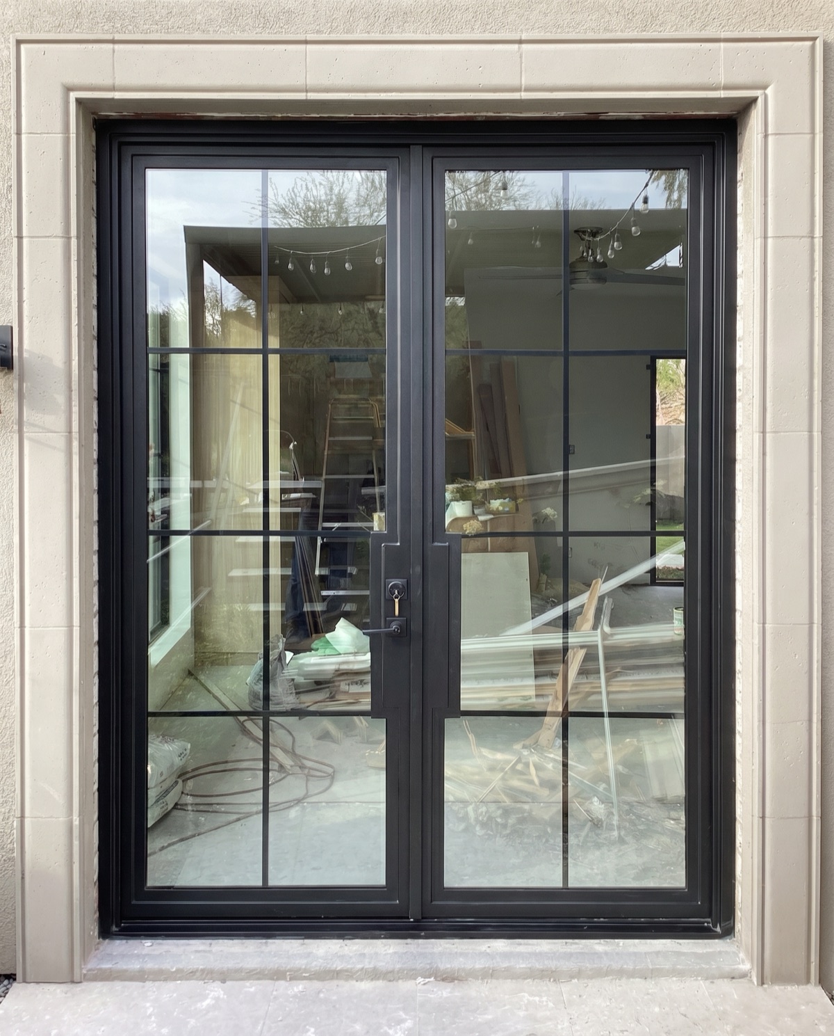 Black-grid French doors, residential by Mad Touch Glass