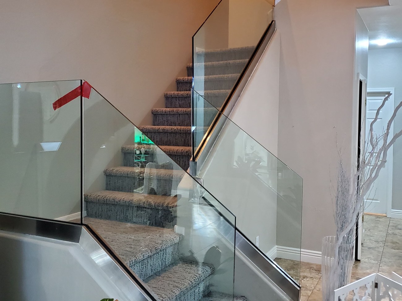 Frameless glass staircase railing, residential install in the Phoenix metro by Mad Touch Glass